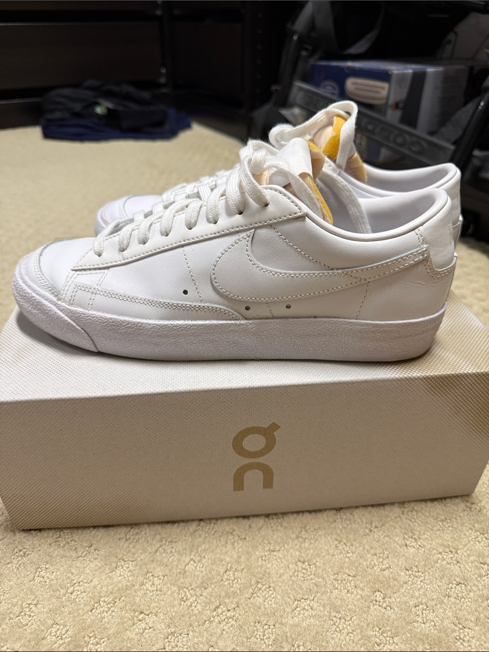 Nike Women’s White Low-Top Leather Sneakers with Yellow Tongue Detail